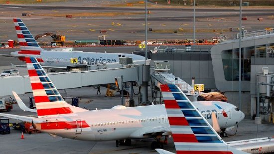 美国航空发布宽幅盈利预测区间 经济不确定性致国内旅